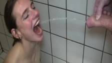 Fisting and pissing on submissive teen slut